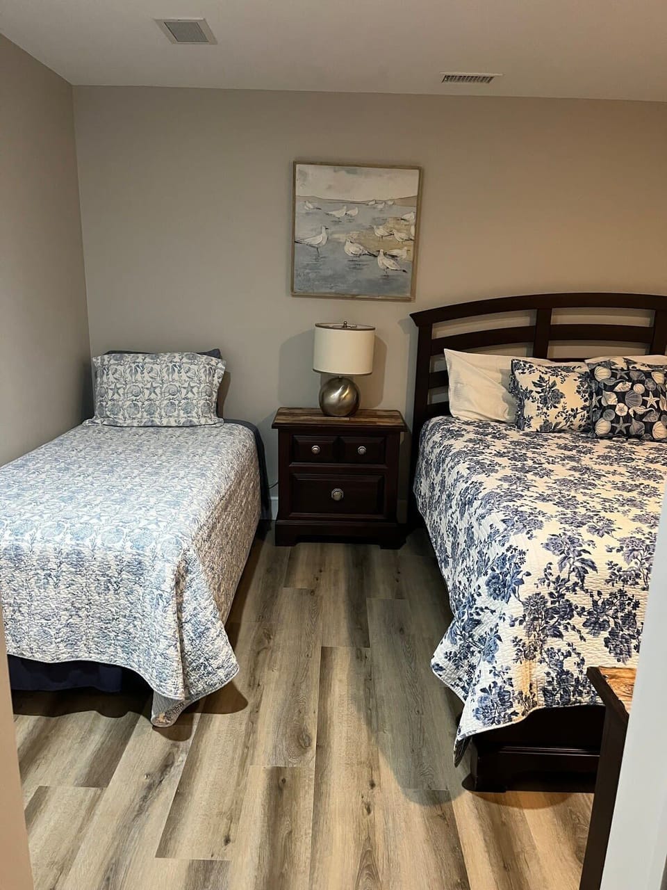 Second bedroom suite with Queen Size Bed and Twin bed. Bathroom connects to bedroom and to the suite.