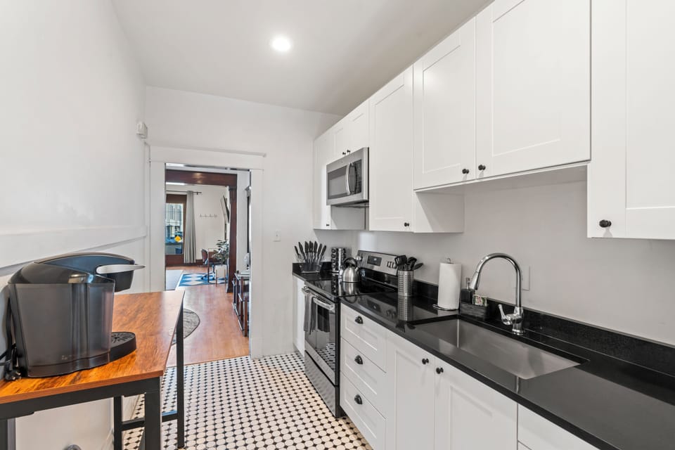 Kitchen with plates, utensils, cups, and all you need to dine.
