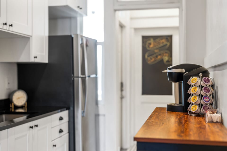 Coffee bar with a Keurig coffee maker plus a variety of K-Cups for a pick-me-up.