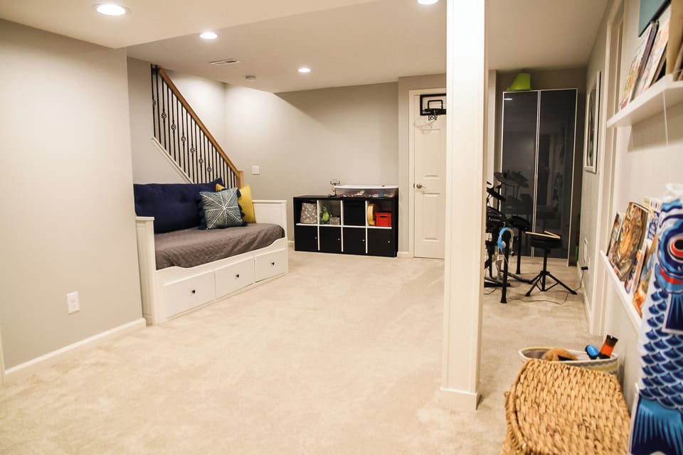 Basement playroom with twin size daybed. Perfect for kids!