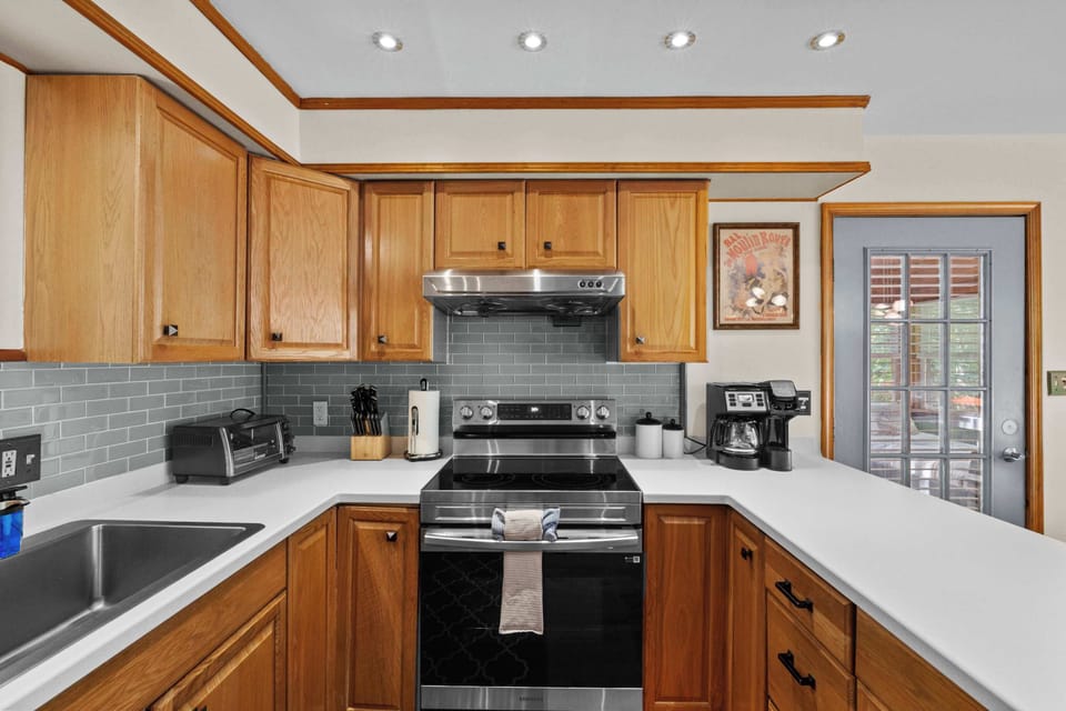 Cook, sip, and relax in this stylish kitchen with top-notch appliances, including a coffee pot and Keurig machine—ideal for making your stay extra special!