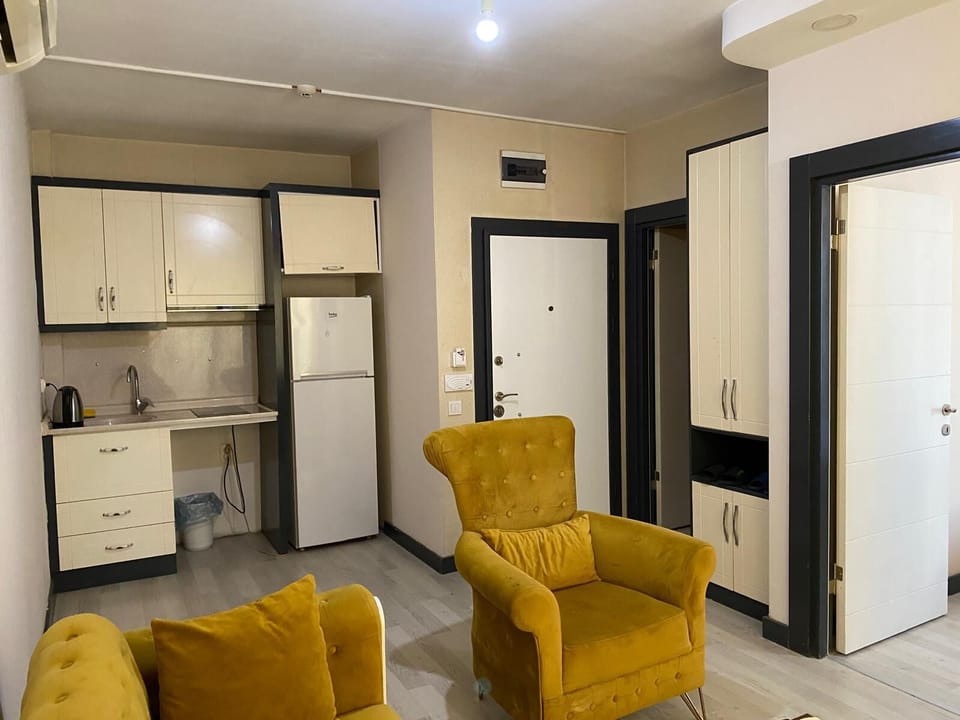 Comfort Condo, Balcony, City View | Private kitchen | Fridge, oven, stovetop, cookware/dishes/utensils