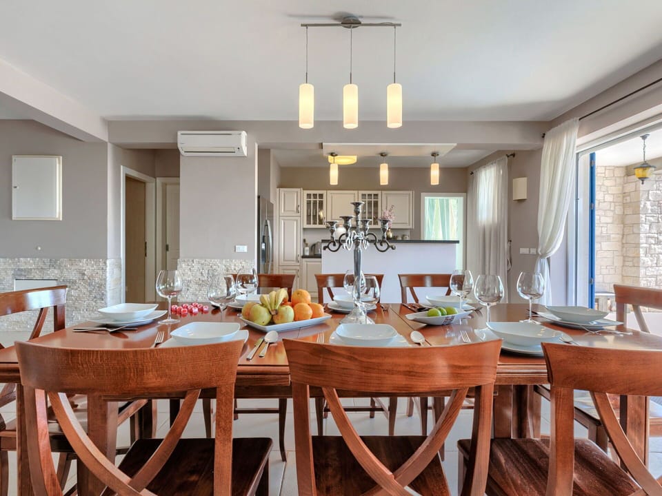 Furniture, Interior Design, Wood, Table, Ceiling, Flooring, Chair, Kitchen & Dining Room Table, Light Fixture, Dining Room