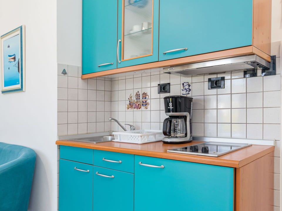 Kitchen, Interior Design, Cabinetry, Countertop, Furniture, Kitchen Sink, Kitchen Appliance, Major Appliance, Room, Sink