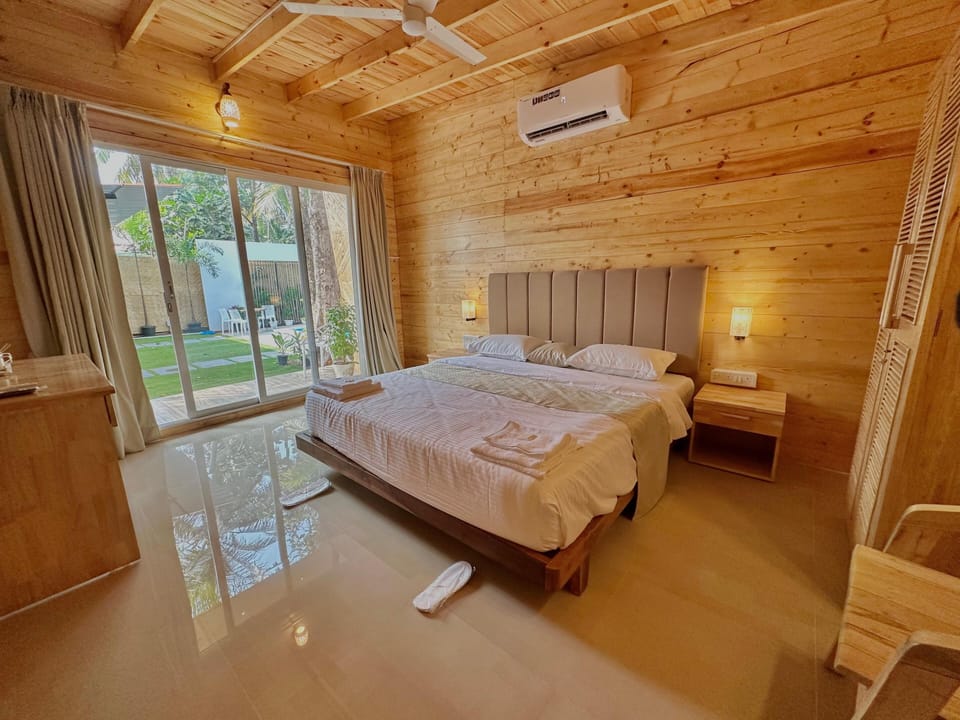 Deluxe Room, Balcony, Pool View | Desk, laptop workspace, iron/ironing board, free WiFi