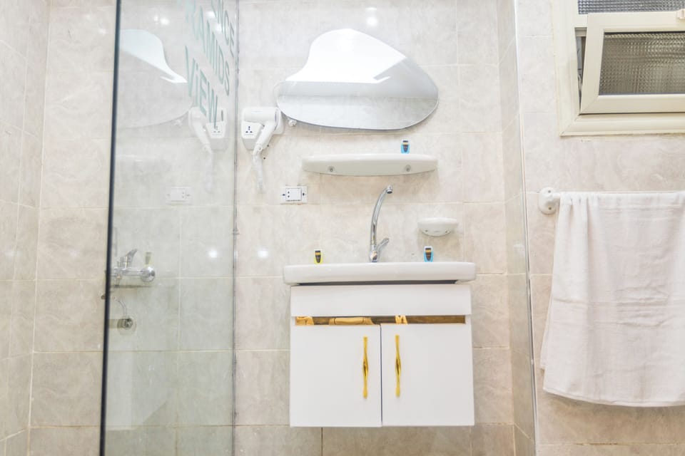 Family Quadruple Room, Desert View | Bathroom | Combined shower/tub, hair dryer, slippers, bidet