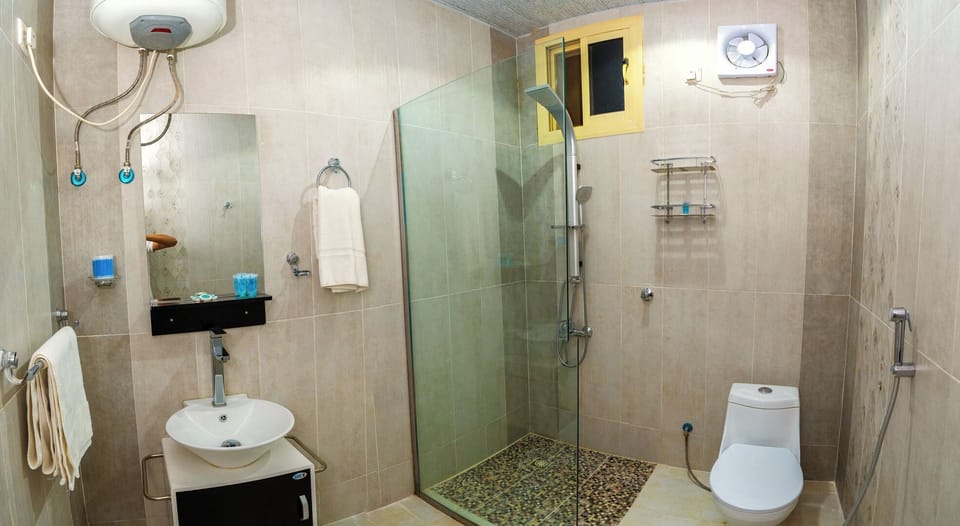 Hair dryer, slippers, towels, soap