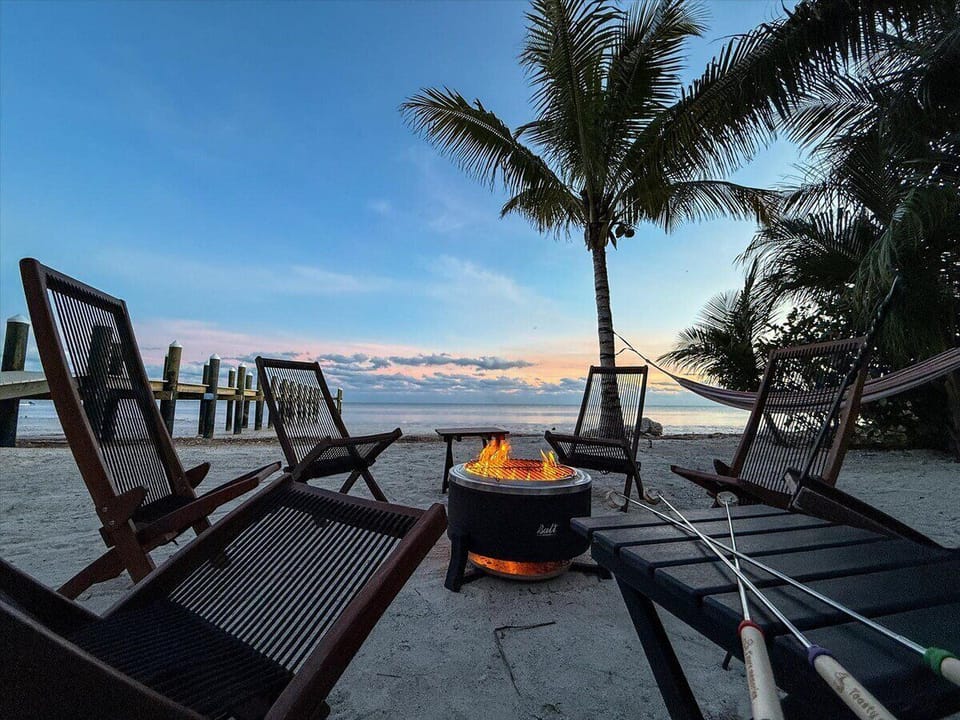 Toast marshmallows while watching sunsets over the Atlantic Ocean.