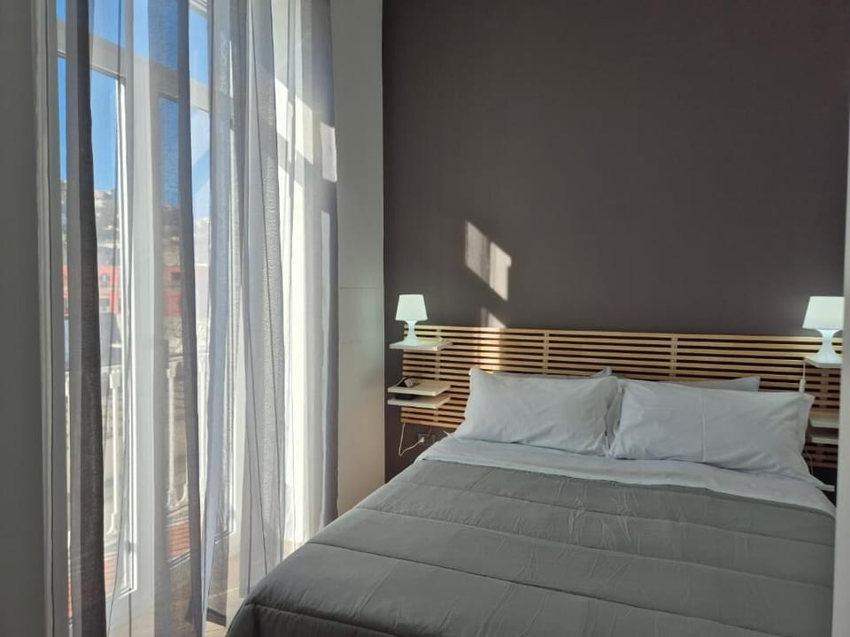 Classic Double Room, Balcony, Hill View | In-room safe, desk, iron/ironing board, free cribs/infant beds