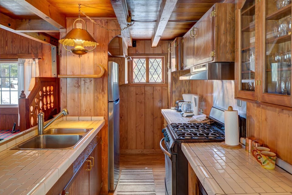 Nicely appointed kitchen adjacent to living room (note there is no dishwasher).