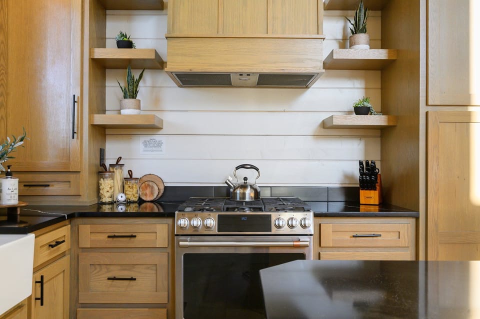 Step through the front door and find yourself instantly welcomed by the heart of the home—the inviting kitchen area.
