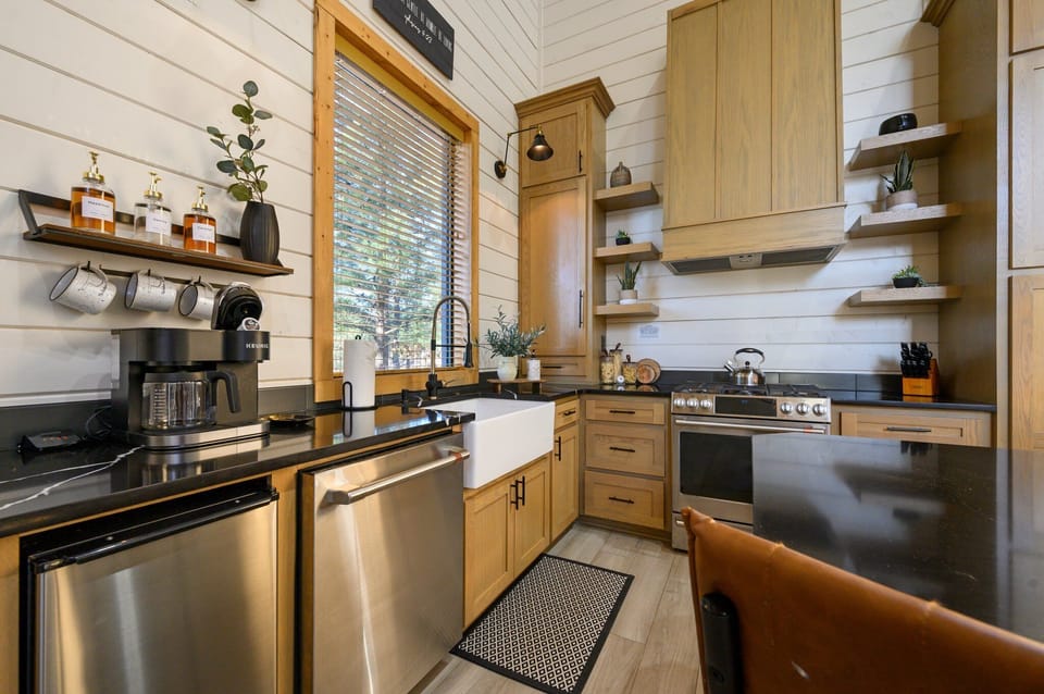 Drifters' kitchen is fully equipped w/ premium appliances, making it the perfect spot to create & share memorable meals w/ your loved ones. With seating for six—two at bistro table & four at t