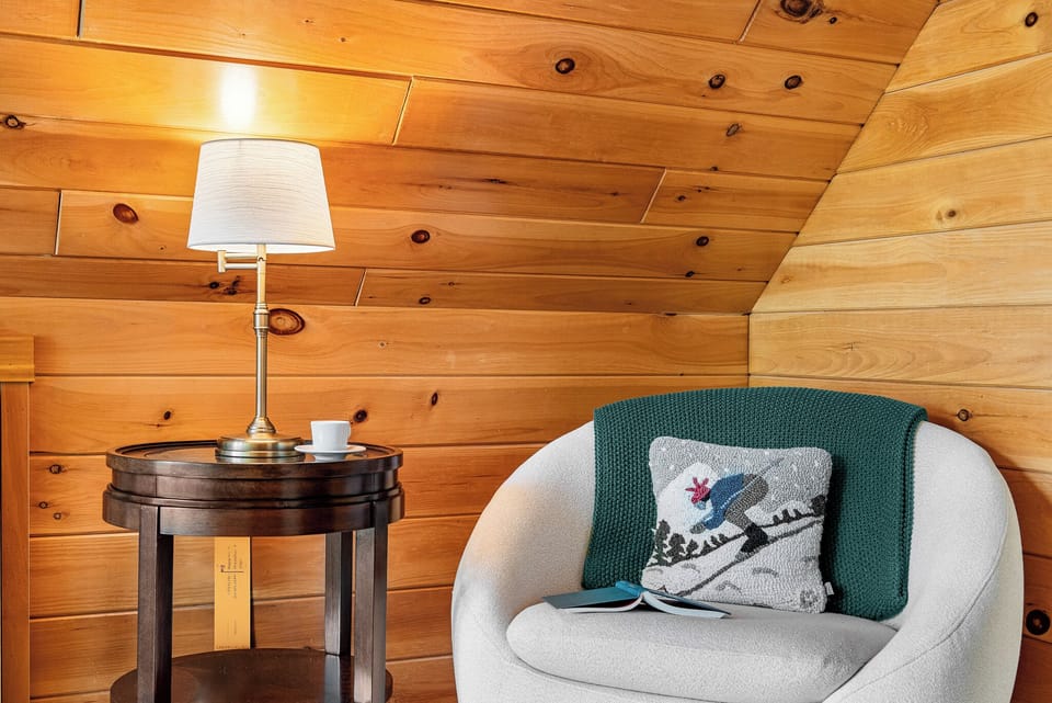 Enjoy this quiet workspace while sipping morning coffee, watching the skiers ski down the slopes.