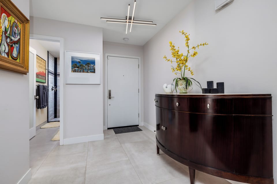 broad hallway leading to the bedroom, offering easy access