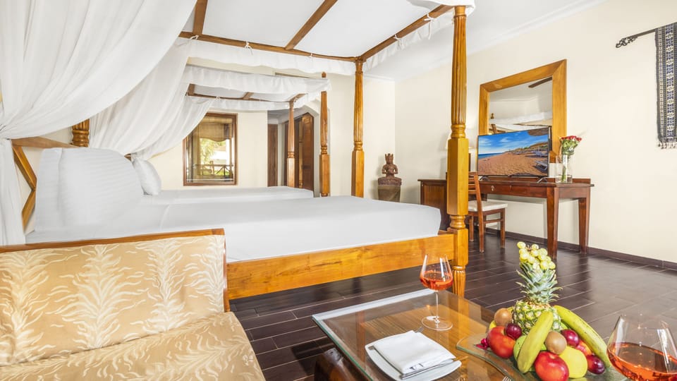 Elisir Twin Room - Pool View | Living area | 32-inch LCD TV with cable channels, TV