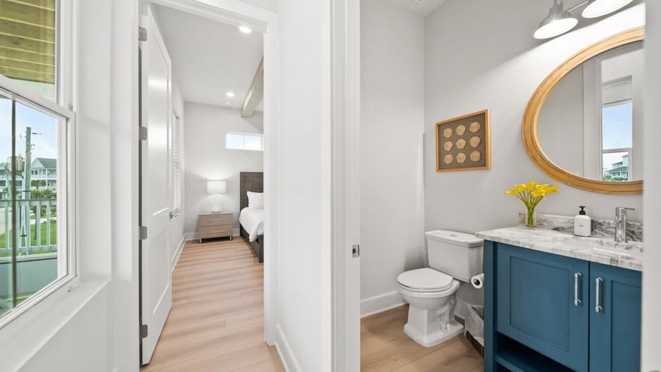 Convenient half bath located just off the main living area