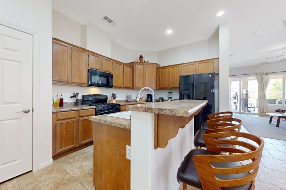 Cook, connect, and create lasting memories in this stylish open-concept kitchen.