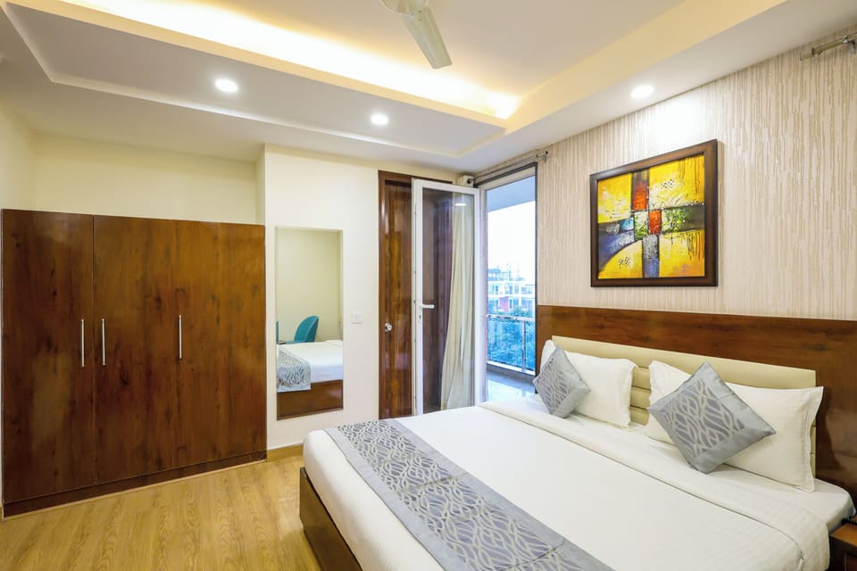 Premium Room with Balcony | In-room safe, desk, laptop workspace, blackout drapes