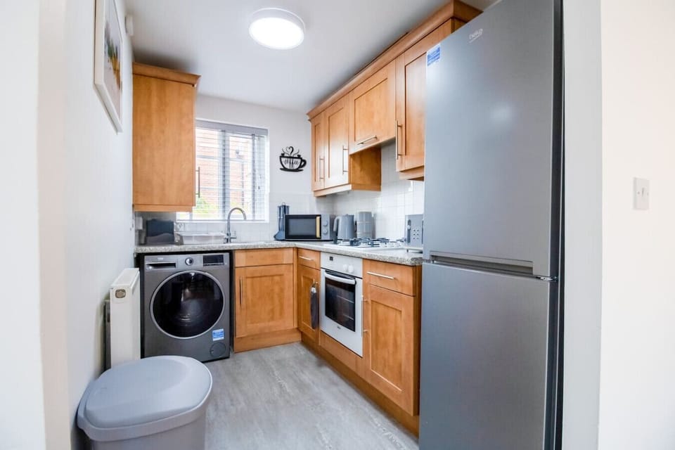 A fully equipped kitchen with everything you need to prepare a home cooked meal.