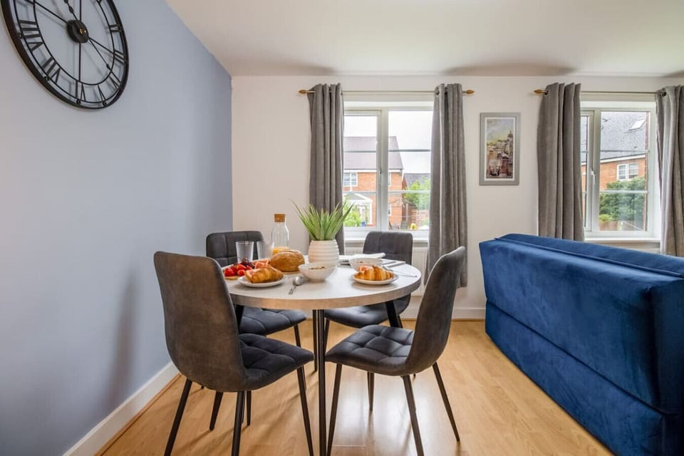 Dining area with seating for up to 4 guests.