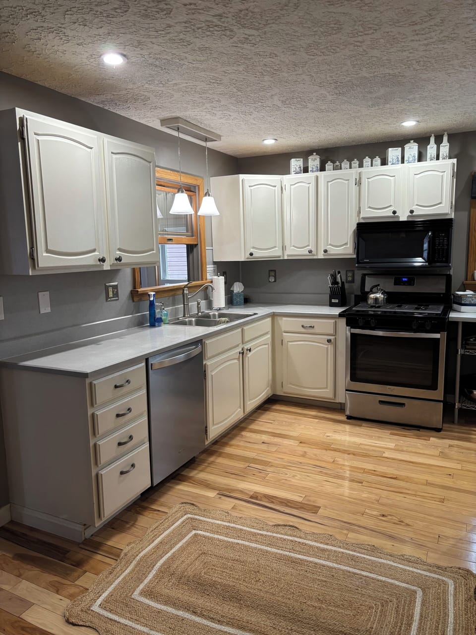 Full stocked kitchen. Gas stove, plenty of cookware, dishes, and utensils.