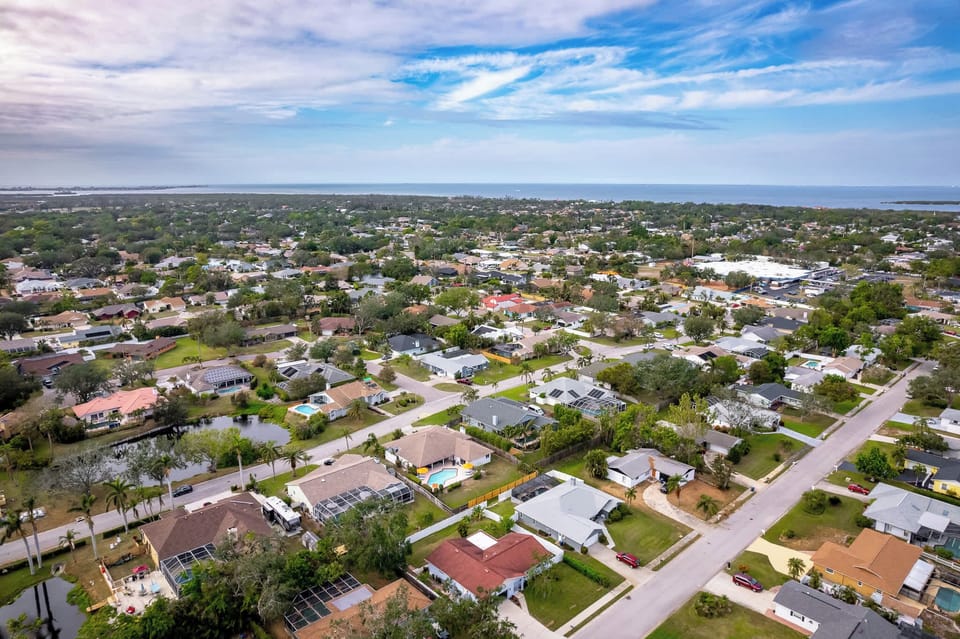 See It from Above! Get a bird's-eye view of the property with these captivating drone shots that highlight the landscape and layout.