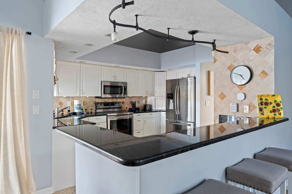 Gourmet Kitchen Awaits! Whether you’re a seasoned chef or a beginner, this spacious kitchen offers everything you need for culinary creativity.