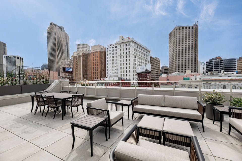 Discover the peak of luxury on our largest, most iconic private terrace, featuring unmatched skyline views and a dynamic panorama of downtown Canal Street.