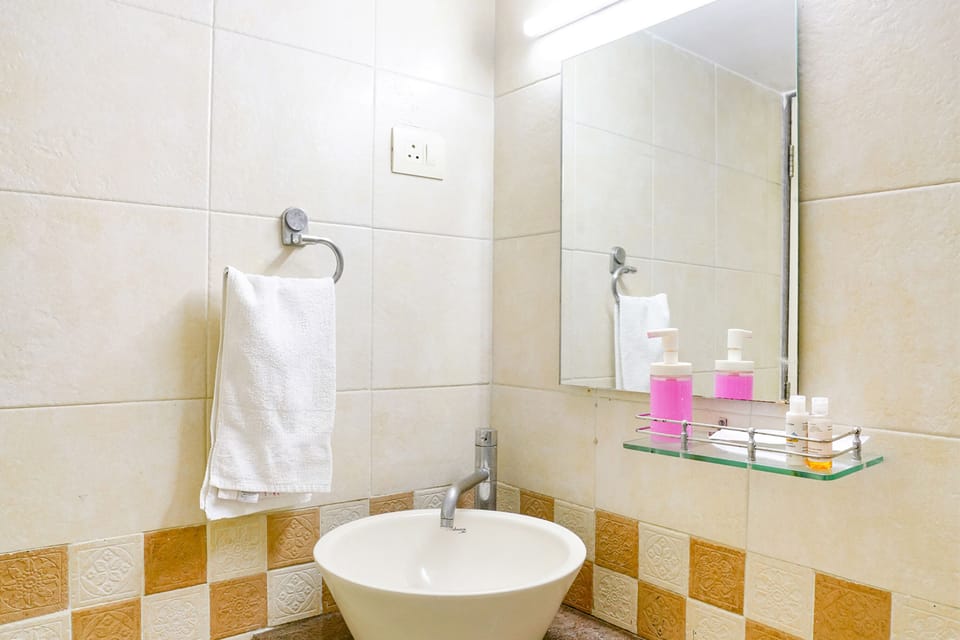 Shower, free toiletries, towels, toilet paper