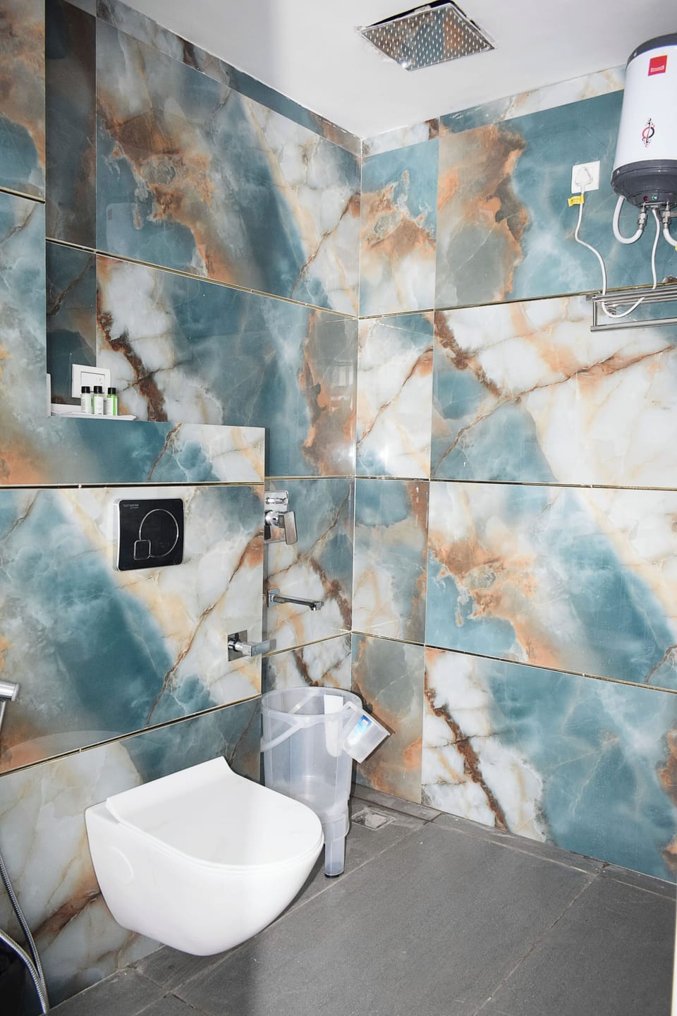 Shower, designer toiletries, hair dryer, bidet