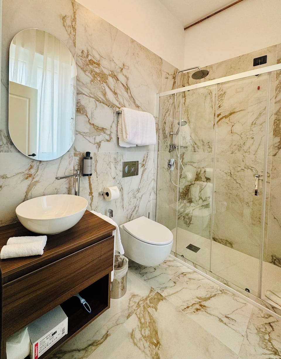 Deluxe Double Room, 1 Queen Bed, Non Smoking, Private Bathroom | Bathroom | Shower, hair dryer, towels, soap