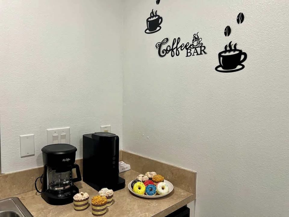 Indulge in your morning routine at this cozy coffee bar, complete with Keurig pods for a hassle-free brew!