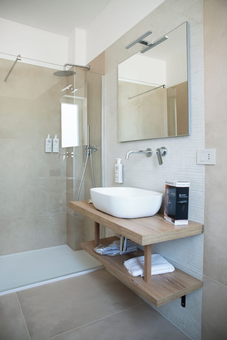 Shower, free toiletries, hair dryer, slippers