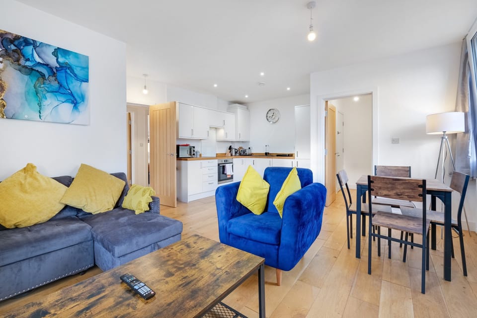 Family Apartment | Living area | 42-inch Smart TV with cable channels, streaming services