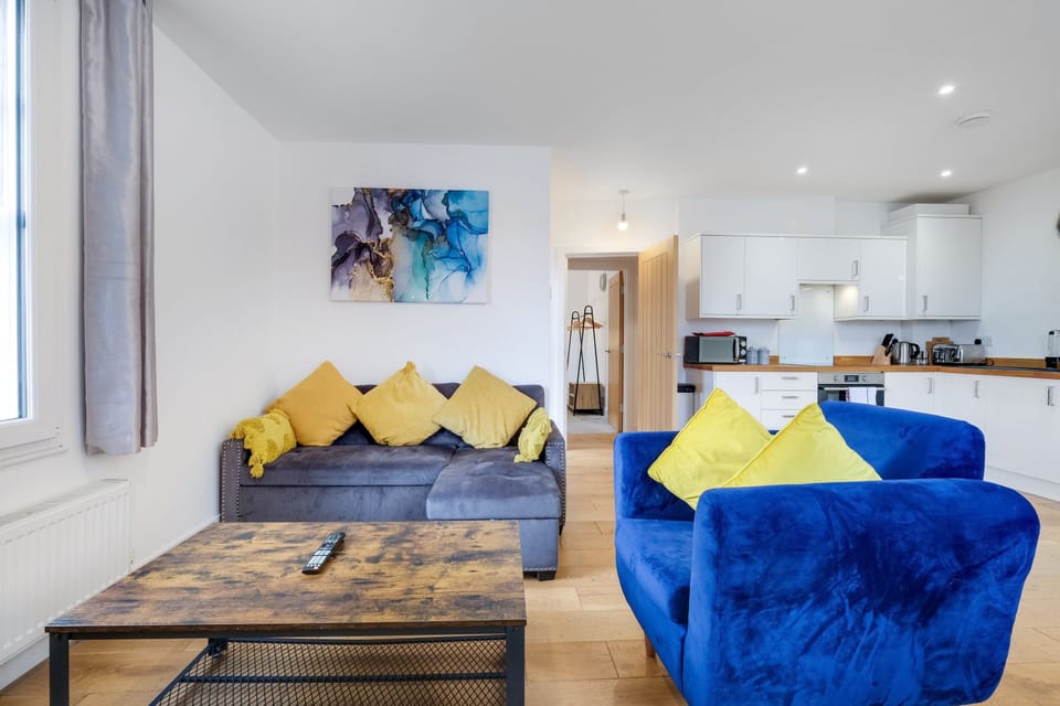 Family Apartment | Living area | 42-inch Smart TV with cable channels, streaming services