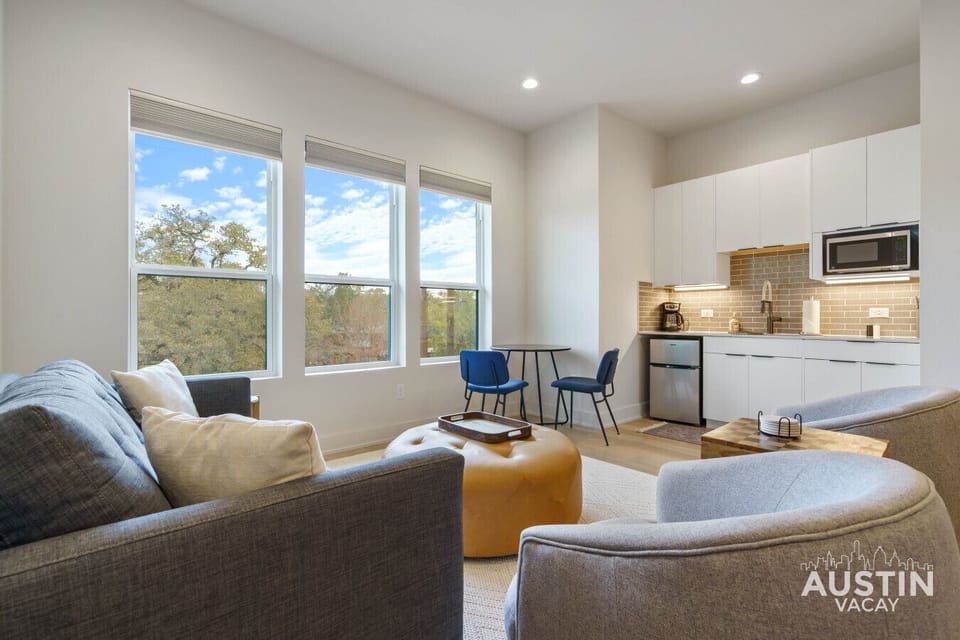 Morning coffee at the table? Movie marathon on the couch? Or chef it up in the kitchen? This cozy spot says, ‘Why not all three?