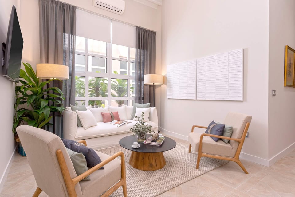 Apartment (2 Bedrooms) | Living room | 52-inch Smart TV with digital channels