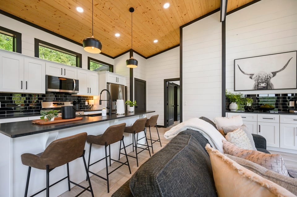 The perfect blend of black and white with a touch of greenery.