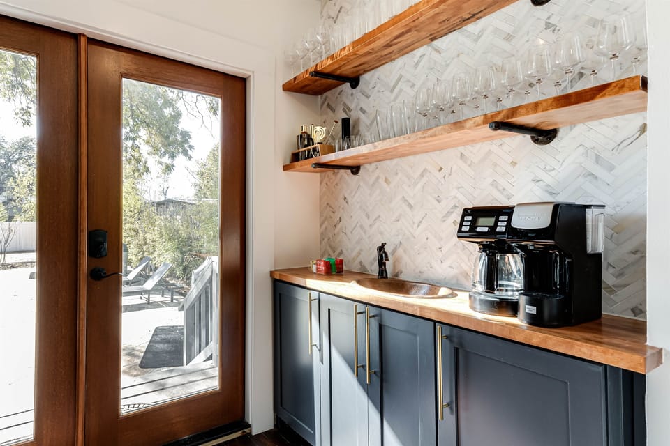 Start your mornings with a fresh brew from the coffeemaker and step out to the backyard oasis for the perfect blend of relaxation and refreshment.