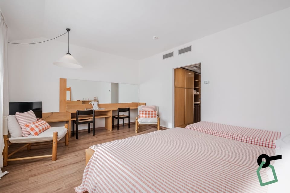 Standard Triple Room | Minibar, in-room safe, desk, cribs/infant beds