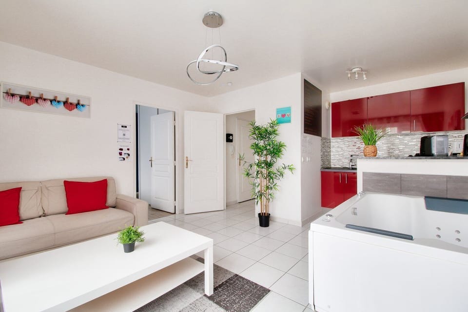 Deluxe Apartment, Garden View | Living area | 120-cm Smart TV with digital channels