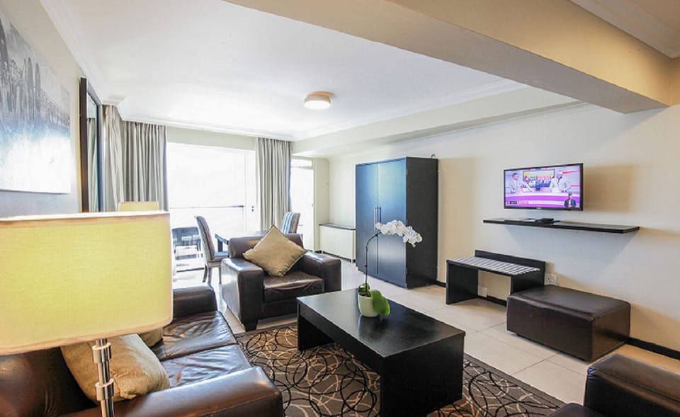 Deluxe Executive Family Suite - Sea Facing | Living area | 50-inch flat-screen TV with satellite channels, TV, Netflix