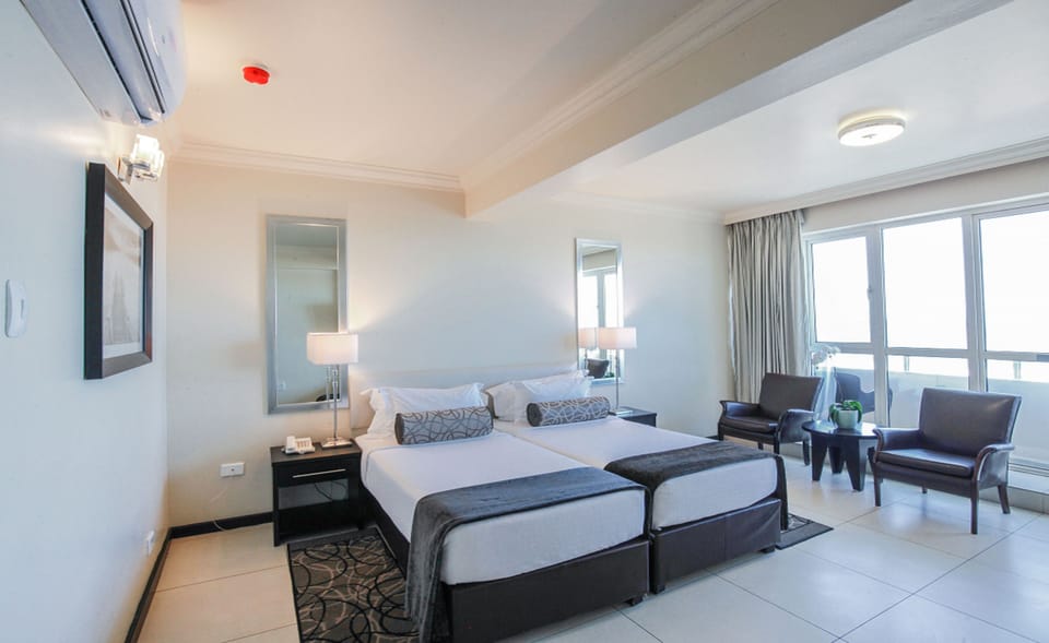 Deluxe Twin Room – Sea Facing | In-room safe, desk, blackout drapes, rollaway beds