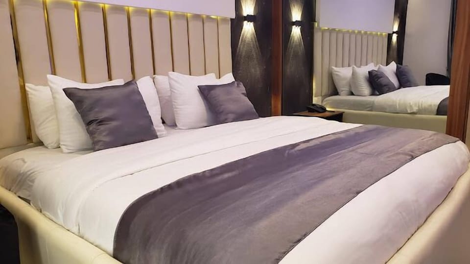 Deluxe Room, Balcony, City View | Desk, laptop workspace, free WiFi