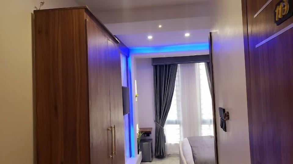 Deluxe Room, Balcony, City View | Desk, laptop workspace, free WiFi