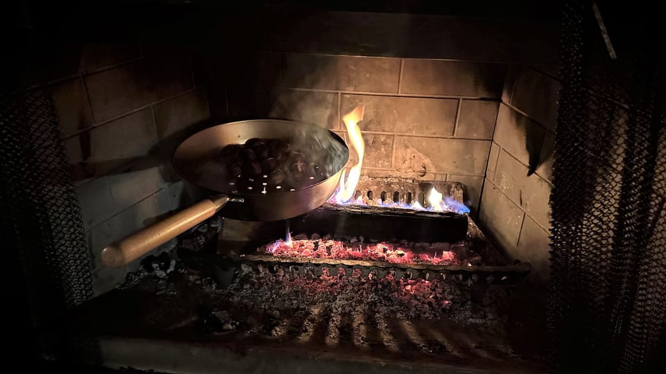 Roasting chestnuts in fireplace. 
We have the chestnut pan and chestnut cracker