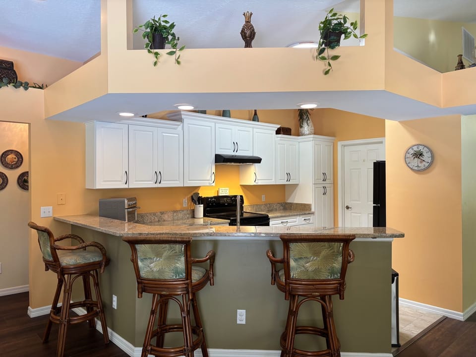 Kitchen counter. Seating for 3.