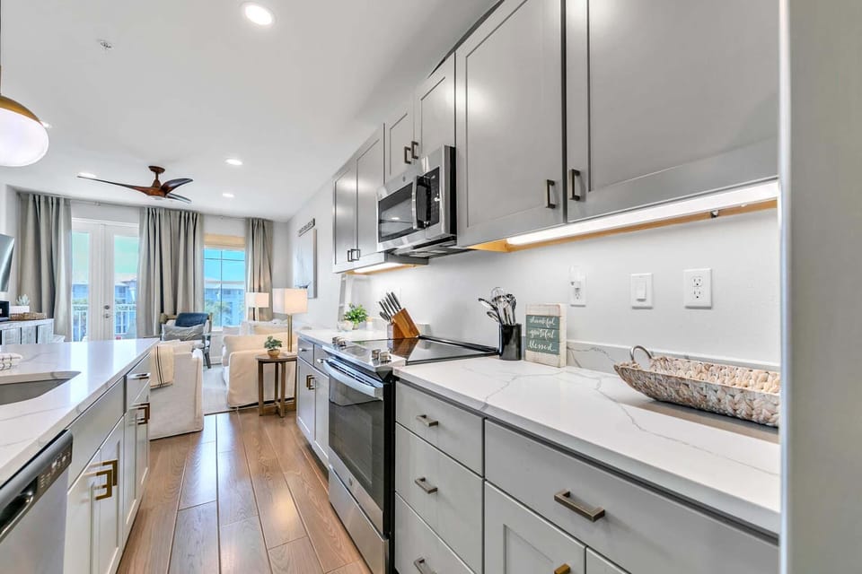 Condo, Multiple Beds (Gulf Place Residences 203) | Private kitchen | Oven, toaster