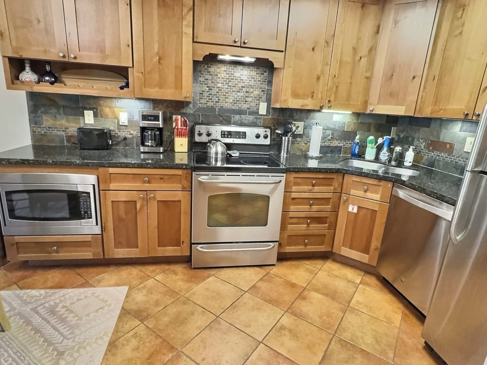 Kitchen with stainless steel appliances