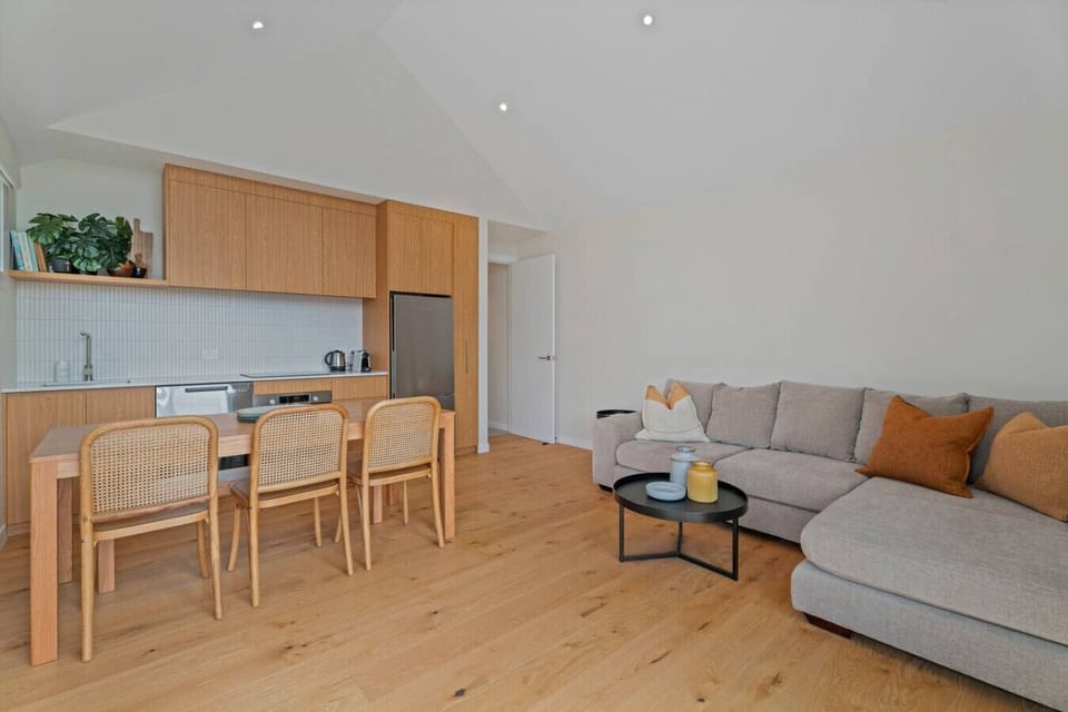 Living area with lounge, dining table (seats 6) and well equipped kitchen.